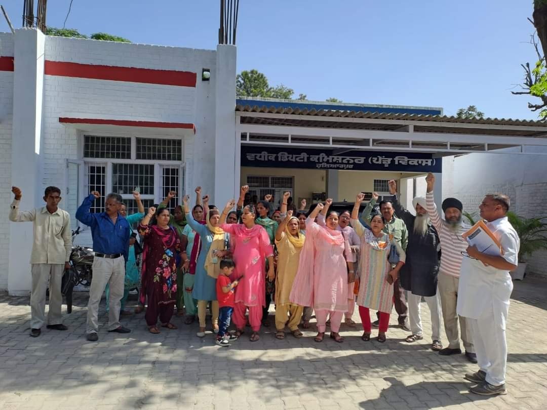 Angry MNREGA employees union leaders protested in front of the ADC (Rural Development) office by shouting slogans.